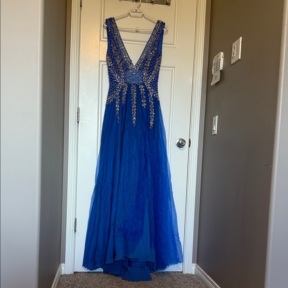 Elegant Blue Evening Gown with Embellishments
BNWOT